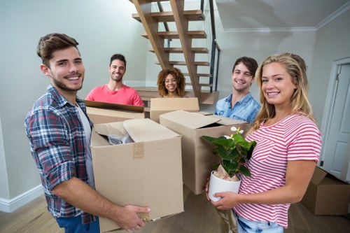 Loading moving boxes into a van for a professional man and van service