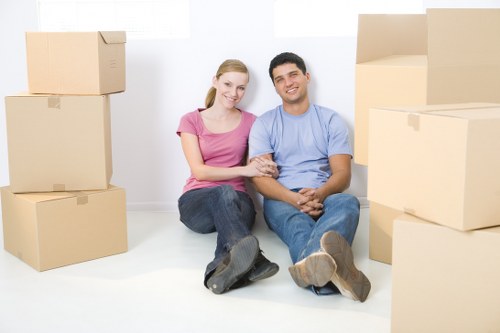 Local removal team planning a house move in Highbury with boxes and furniture