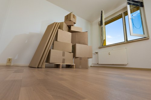 Office relocation planning in Highbury with packed boxes and office furniture