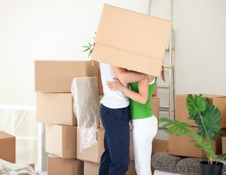 Loading office furniture for a business move near Highbury