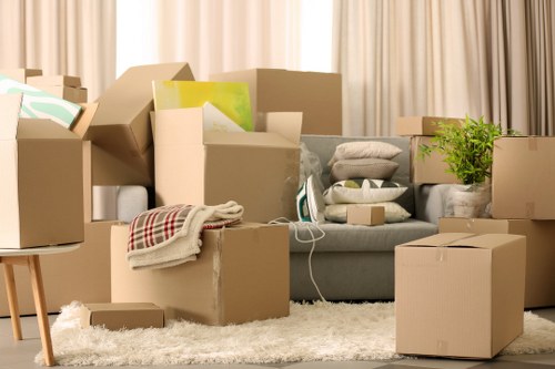 Packed boxes and furniture ready for a home relocation in Highbury