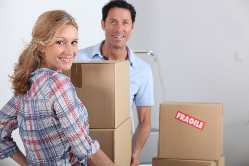 Packed boxes and labelled business items for relocation in Highbury