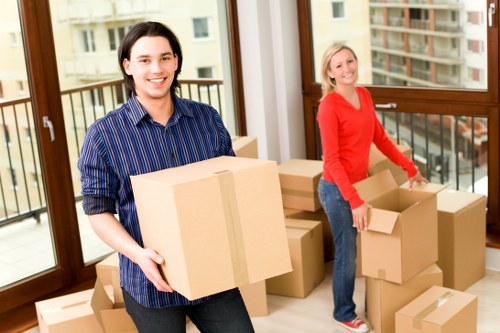 Careful removal of sofas, beds, and wardrobes from a Highbury property