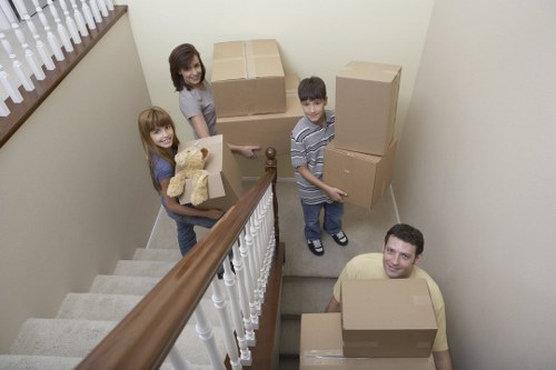 Careful handling of packed belongings during a Highbury apartment move